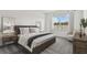 Bright bedroom with large window and comfortable seating at 1686 Fallon Pass, Zephyrhills, FL 33541