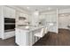 Modern kitchen with stainless steel appliances and an island at 1686 Fallon Pass, Zephyrhills, FL 33541