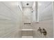 Large walk-in shower with built-in seat and modern fixtures at 1686 Fallon Pass, Zephyrhills, FL 33541