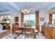 Spacious dining area with hardwood floors and natural light at 2403 Richmond Greens Ct, Sun City Center, FL 33573