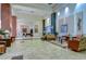 Spacious lobby featuring comfortable seating, stylish decor, and plenty of natural light at 2403 Richmond Greens Ct, Sun City Center, FL 33573