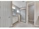 Bathroom with shower, toilet and granite countertop vanity at 5607 Limelight Dr, Apollo Beach, FL 33572