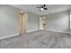 Large bedroom with gray carpet and lots of natural light at 5607 Limelight Dr, Apollo Beach, FL 33572