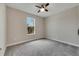 Bright bedroom with carpeted floor and ceiling fan at 5607 Limelight Dr, Apollo Beach, FL 33572