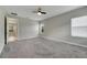 Spacious primary bedroom with door to en-suite bath at 5607 Limelight Dr, Apollo Beach, FL 33572