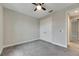 Spacious bedroom with carpeted floor and ceiling fan at 5607 Limelight Dr, Apollo Beach, FL 33572