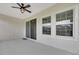 Covered patio with sliding glass door access at 5607 Limelight Dr, Apollo Beach, FL 33572