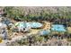 Community pool, tennis courts, and clubhouse at 20308 Oak Key Ct, Tampa, FL 33647
