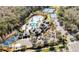 Aerial view of community amenities including pool, tennis courts, and playground at 20308 Oak Key Ct, Tampa, FL 33647