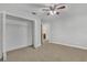 Bedroom with walk-in closet and access to bathroom at 10142 Kingsbridge Ave, Tampa, FL 33626