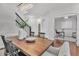 Dining room with view of home office and hardwood floors at 10142 Kingsbridge Ave, Tampa, FL 33626