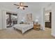 Spacious main bedroom with sliding doors to the backyard at 10142 Kingsbridge Ave, Tampa, FL 33626