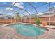 Inviting screened pool with brick pavers at 10142 Kingsbridge Ave, Tampa, FL 33626