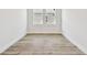 Bright bedroom with neutral carpeting and large windows at 11814 Richmond Trl, Parrish, FL 34219