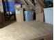 Unfinished attic area offering additional storage at 16850 Whisper Elm St, Wimauma, FL 33598