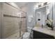 Bathroom with a walk-in shower and modern vanity at 207 Chippewa Ave, Tampa, FL 33606