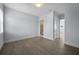 Bright bedroom with hardwood floors and access to bathroom at 207 Chippewa Ave, Tampa, FL 33606