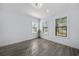 Bright bedroom with hardwood floors and large windows at 207 Chippewa Ave, Tampa, FL 33606