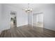 Bright dining room with hardwood floors and chandelier at 207 Chippewa Ave, Tampa, FL 33606