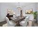 Elegant dining room with chandelier and hardwood floors at 207 Chippewa Ave, Tampa, FL 33606