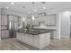 Modern kitchen with large island and stainless steel appliances at 207 Chippewa Ave, Tampa, FL 33606