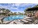 Stunning resort-style pool with multiple lounge areas at 4504 Isonzo Way, Wesley Chapel, FL 33543