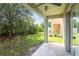 View of backyard from covered patio at 4978 White Sanderling Ct, Tampa, FL 33619