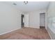 Spacious bedroom with neutral walls and carpet at 4978 White Sanderling Ct, Tampa, FL 33619