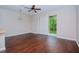 Bright dining room with hardwood floors and sliding glass doors at 4978 White Sanderling Ct, Tampa, FL 33619