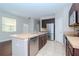 Eat-in kitchen with stainless steel appliances and light countertops at 4978 White Sanderling Ct, Tampa, FL 33619