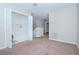 Upstairs laundry room with built in shelving at 4978 White Sanderling Ct, Tampa, FL 33619