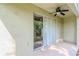 Covered patio with sliding glass doors at 4978 White Sanderling Ct, Tampa, FL 33619