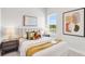 Bright bedroom with a queen-size bed and modern decor at 6258 Broad Field Ave, Apollo Beach, FL 33572