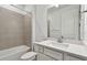 Clean bathroom, featuring a bathtub and white vanity at 9415 Coastline Way, Parrish, FL 34219