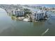 Waterfront condo community boasts a pool, tennis courts, boat docks and stunning water views at 9495 Blind Pass Rd # 206, St Pete Beach, FL 33706