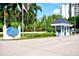 The Yacht & Tennis Club features lush landscaping, a security booth and an attractive entrance at 9495 Blind Pass Rd # 206, St Pete Beach, FL 33706