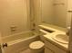 Clean bathroom with shower/tub combo and vanity at 3198 Claremont Pl # D, Palm Harbor, FL 34683