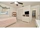 Bedroom with white dresser, closet, carpet floor and natural light from the window at 13084 Drysdale St, Spring Hill, FL 34609