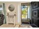 Inviting entryway featuring decorative details, neutral colors, and lots of natural light at 13084 Drysdale St, Spring Hill, FL 34609