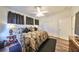 King bedroom with dark wood furniture and large closet at 1361 Emerald Dunes, Sun City Center, FL 33573