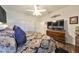 Bedroom with king bed and dark wood dresser at 1361 Emerald Dunes, Sun City Center, FL 33573