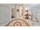Spacious hallway with tile flooring and access to bedrooms at 1361 Emerald Dunes, Sun City Center, FL 33573
