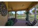 Spacious lanai with golf course views and comfortable seating at 1361 Emerald Dunes, Sun City Center, FL 33573