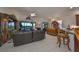 Spacious living room with golf course views and fireplace at 1361 Emerald Dunes, Sun City Center, FL 33573