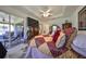 Main bedroom with king bed and access to private patio at 1361 Emerald Dunes, Sun City Center, FL 33573