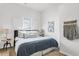 Bedroom with king-size bed, and light walls at 2601 N 19Th St, Tampa, FL 33605