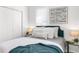 Spacious bedroom with a comfortable bed and plenty of pillows at 2601 N 19Th St, Tampa, FL 33605