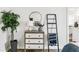 Stylish bedroom featuring a dresser, mirror, and ladder at 2601 N 19Th St, Tampa, FL 33605