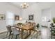 Modern dining area with a wooden table and stylish chairs at 2601 N 19Th St, Tampa, FL 33605