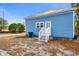 Charming blue house with a white porch at 2601 N 19Th St, Tampa, FL 33605